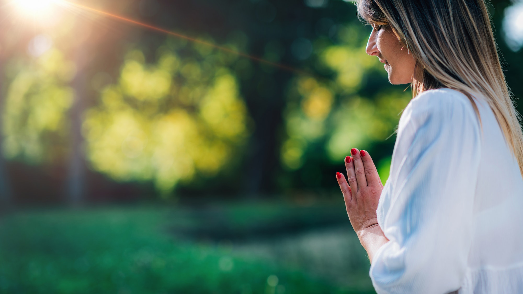 Meditation by the Water, Hands in Prayer Position.